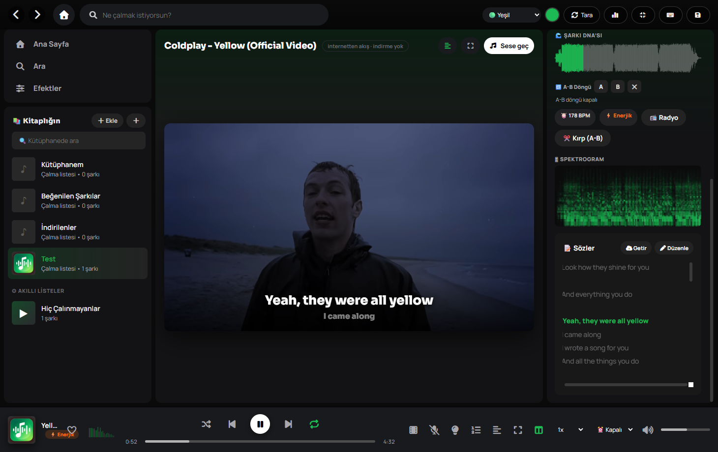 Just Music Premium klip modu — Coldplay Yellow klibi oynarken sözler videonun üstünde senkron akıyor, sağ panelde Şarkı DNA'sı ve spektrogram